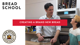 Martin and Arlo in the kitchen with a mixing bowl